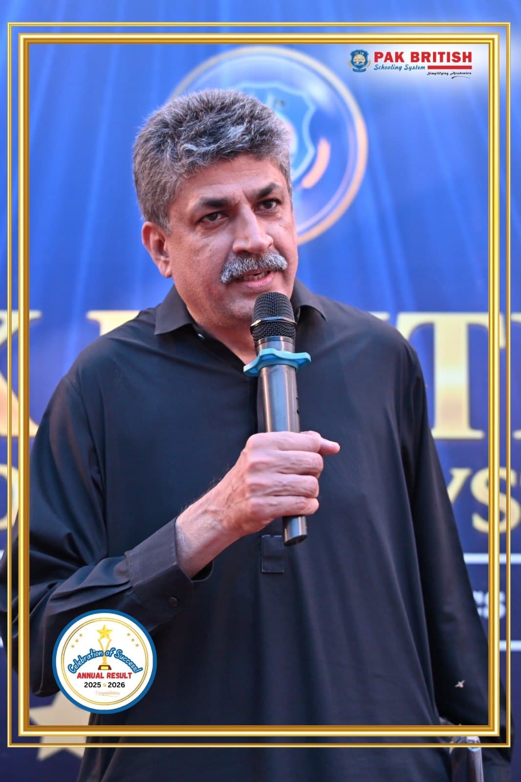 A speaker addressing the audience at the Pak British Schooling System annual result ceremony